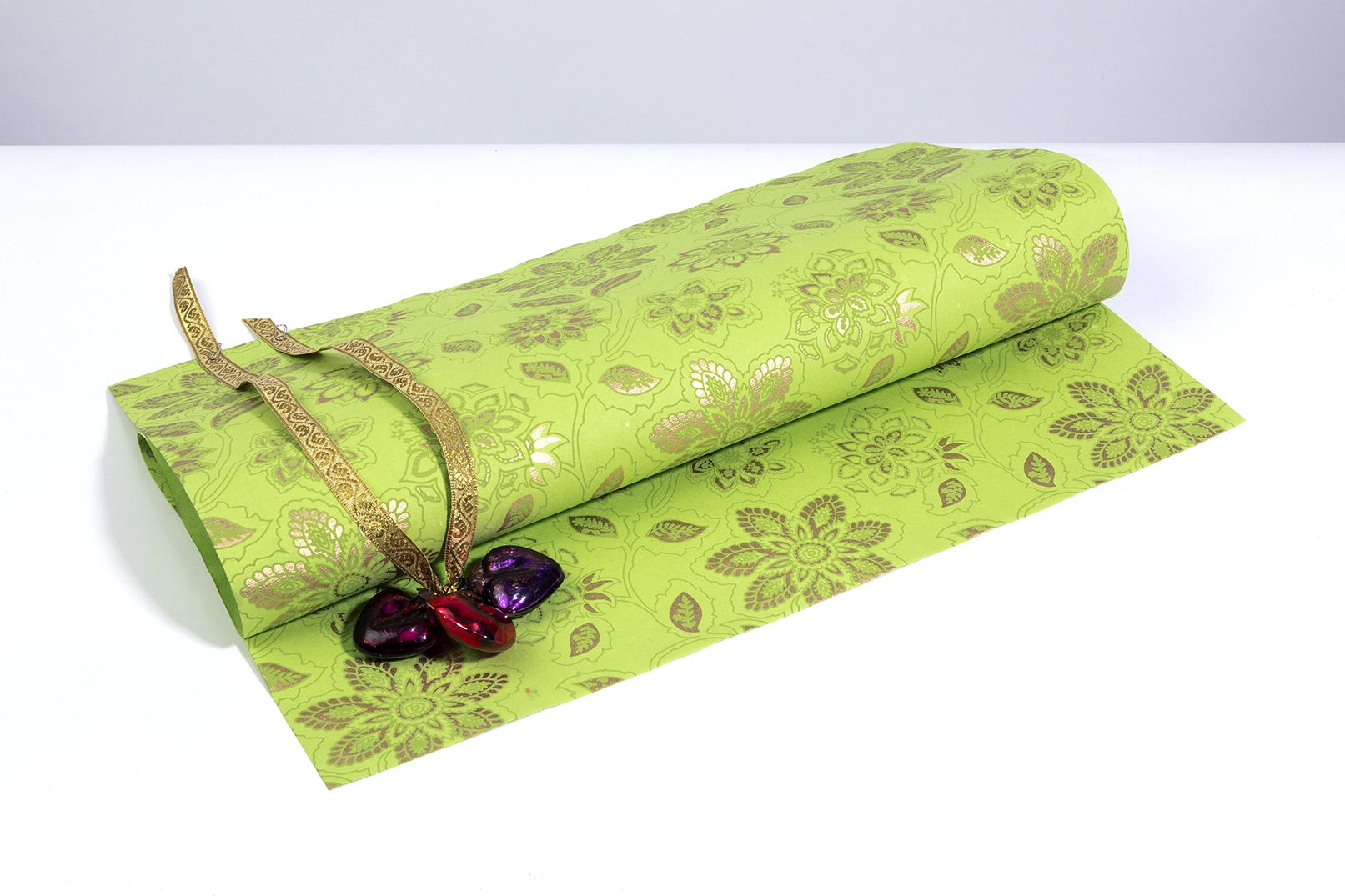 Wrapping paper green dahlia is full of blooming flowers & eco friendly.