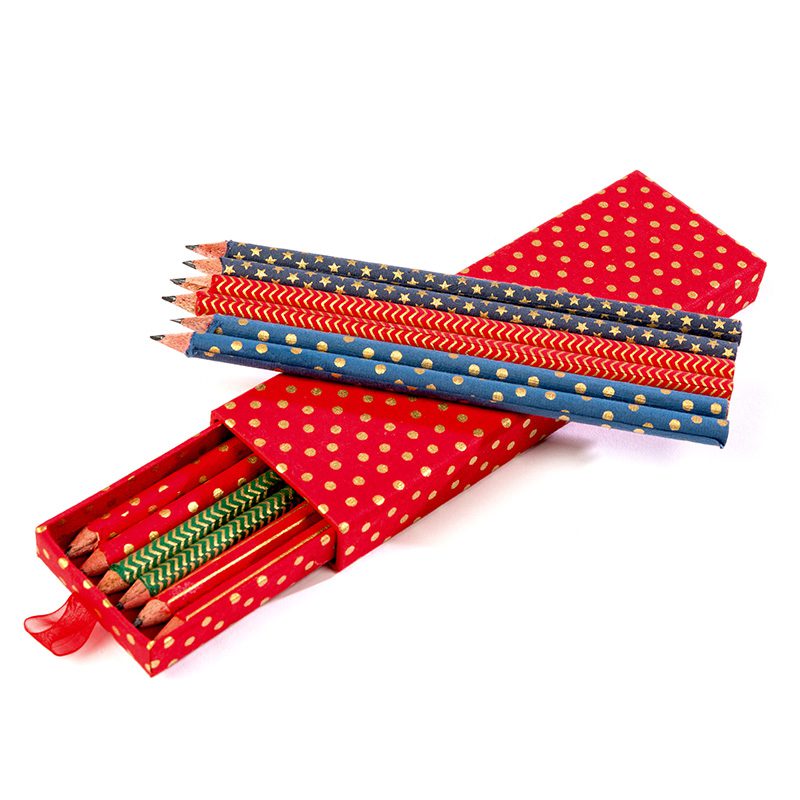 Handmade pencils elegantly presented in a handmade paper gift box